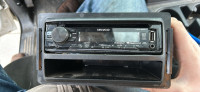 Kenwood stereo with wiring harness and mounting bracket