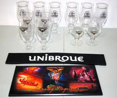 From the Unibroue brewery in Quebec 3 different sizes and styles of beer glasses, Living Legend sign...