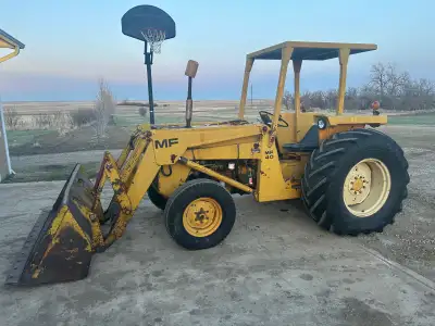 MOTIVATED SELLER! Open to offers! Massey Ferguson 40 Industrial Loader. Runs and drives. Loader work...