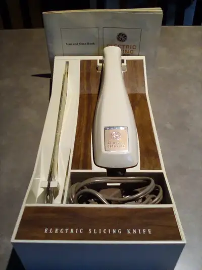 Couteau électrique, General Electric, feuillet d'instruction., View more