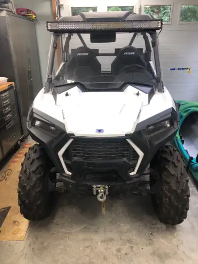 Winch, front and rear window and light bar. Little use with only 800km. Asking $15000.