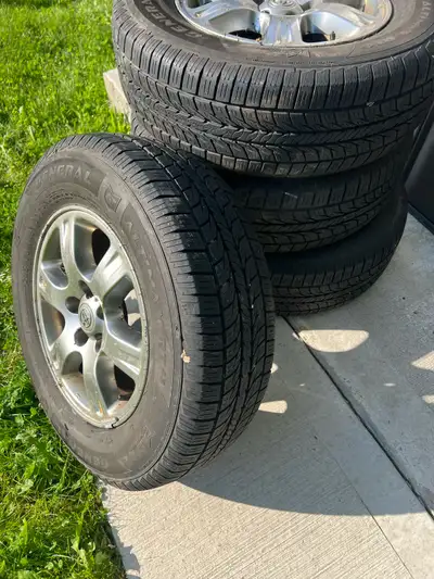 Complete set of four tires. Oem Toyota rim. 4 tires size 225/70R16.