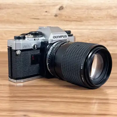 Shipping $20 anywhere in Canada. Located in ORLEANS. Excellent working condition. Comes with 135mm l...