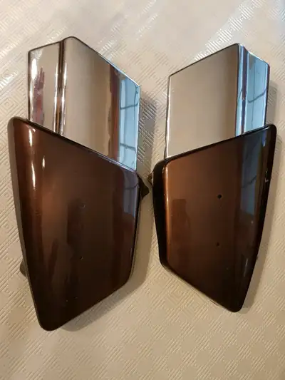 A good used set of side covers that were professionally repainted to a Rootbeer color. All the mount...