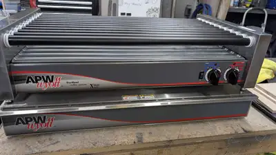APW Wyott HRS-50 hot dog roller with SPTU-50 thermo drawer. Commercial restaurant / concession equip...