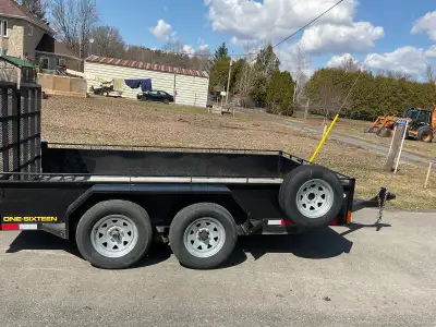 12x7 Utility Trailer, tandem axle, Split tail gate. Low kms, like new, spare tire