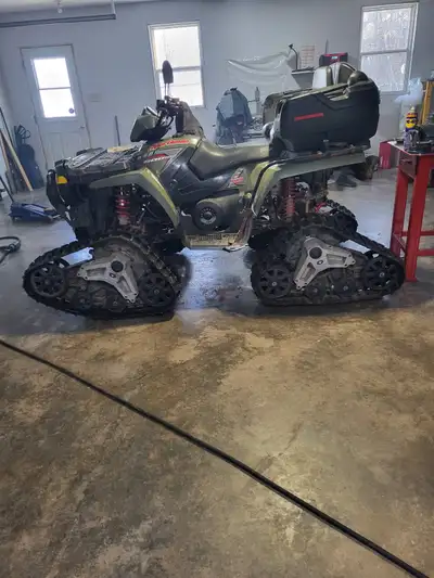 With tracks 600 twin, 38 thousand km. Comes with tires on rims . Just tuned up and ready for plowing...