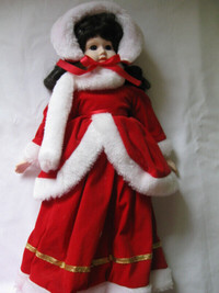 17 inch Porcelain Doll in Red Velour Cape  $45.