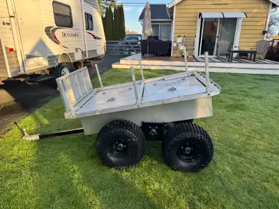Custom made quad tub trailer in great condition. Flat deck for hauling longer objects. Walking beam...