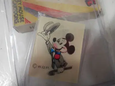 This is a Lenticular identification tag from the art corner at Disneyland.Image changes when tilted....