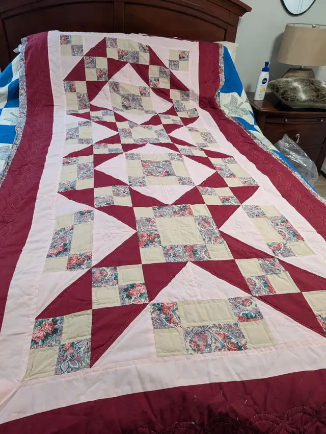 Hand made quilt from the 80s clean and perfect shape