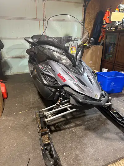 09 Venture in excellent condition. New studded track new ,fox shocks 16000 km,2up seat heated grips...