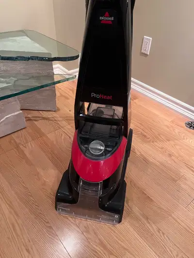 I'm selling a used Bissell ProHeat carpet cleaner in good condition. This powerful machine is design...