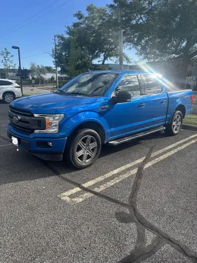 2019 Ford F150 Sport Model, Velocity Blue. In good shape. Comes with tow package, tonneau cover, blu...