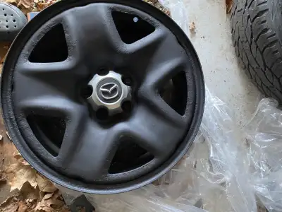 4 OEM 17" Mazda steel rims; 5 bolt pattern Will fit on Mazda B4000 trucks and Mazda SUVs; off a Mazd...
