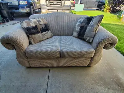 Couch and pillows for $80 70" Length with 36" Width, View more