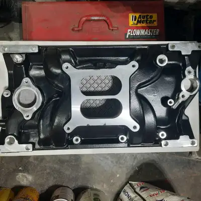 Brand new. SBC Vortec Intake Manifold from Summit Racing. Carbureted, Cast Aluminum, Black, 1,500-6,...