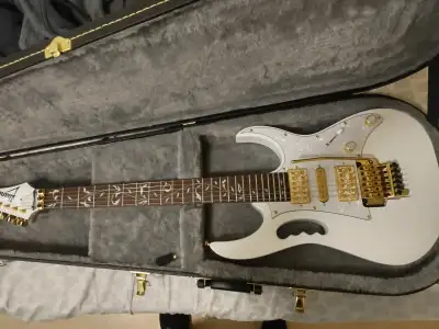 Selling a unique, professionally-built guitar: the body and neck of a JEM Jr, fully upgraded with al...