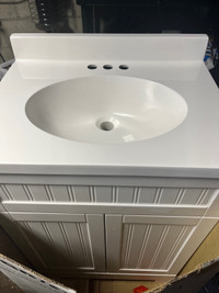 New 24” vanity with sink never installed 