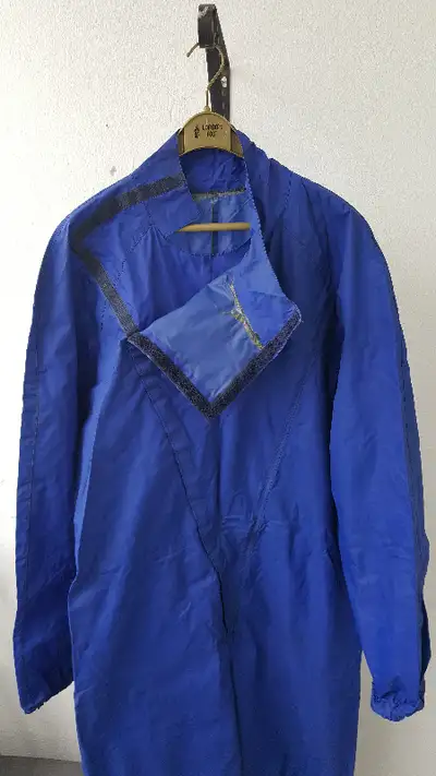 Custom made one-piece nylon riding rain-suit in excellent condition. Size about large or 46 regular....