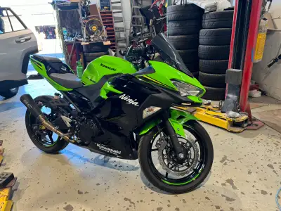 Selling my Ninja 400 Slip on exhaust Integrated taillight with flash relay dark windscreen replaced...