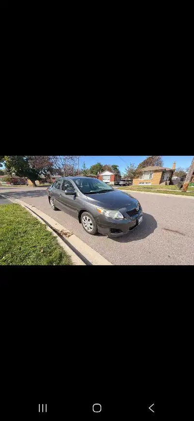 This reliable Toyota Corolla CE is a dependable sedan that features a fuel-efficient engine and a co...