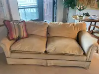 Custom  3 seater sofa w/down feathers and bronze nailheads.