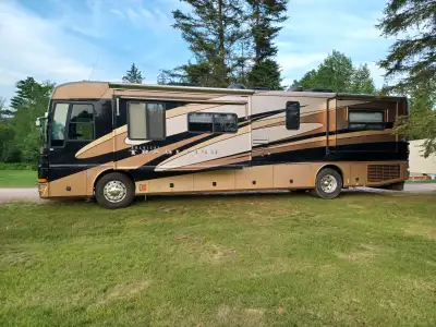 High end motor coach with a 370 HP 8.9L Cummings turbo pre DEF engine and Allison 6 speed auto trans...