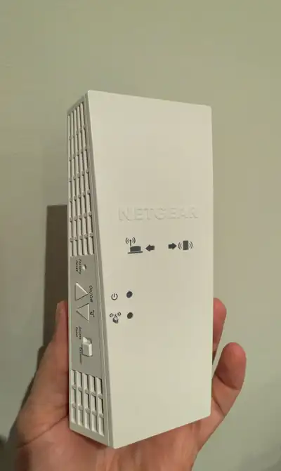 I'm selling a used Netgear AC1750 WiFi Mesh Extender, model EX6250 (2 pieces), that enhances your ex...