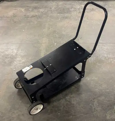 Heavy-duty welding cart in good used condition. Solid and sturdy—perfect for holding your welder, ga...