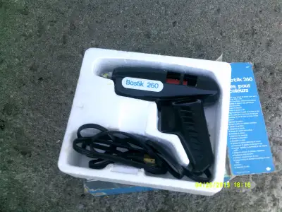 BOSTIK 260 ELECTRIC GLUE GUN WILL BOND WOOD, LEATHER, TILE, AND MOST POROUS MATERIALS IN 60 SECONDS...