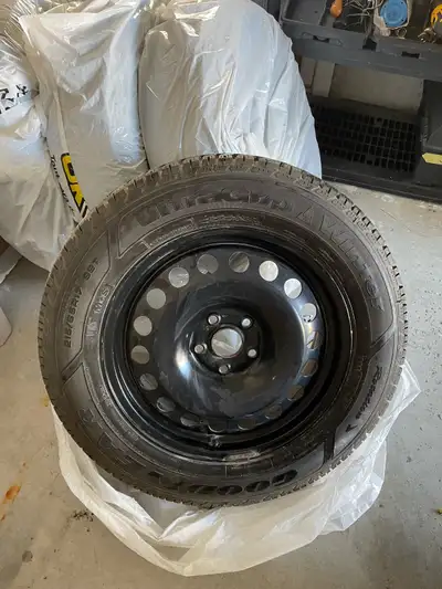 Set of four Goodyear Ultra Grip winter tires, sized 215/65R17, are ready to provide reliable tractio...