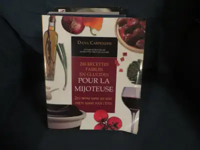 Livre de Cuisine. De Dana Carpender. Titre ; - 200 recettes faibles en Glucides pour la Mijoteuse, P...