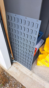 Yellow bins and holder for garage