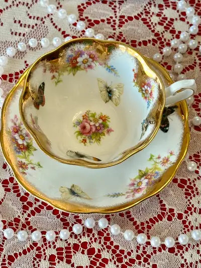 Heavy gold trim avon shaped butterfly  tea cup , View more