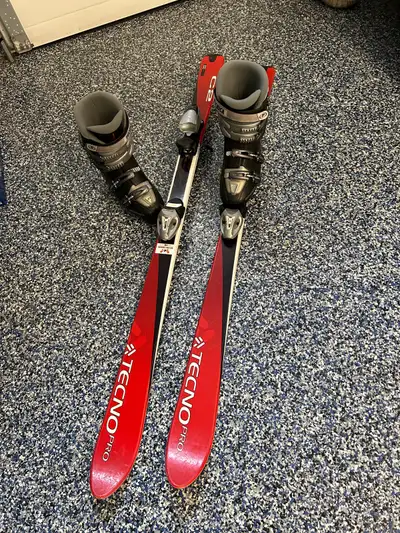 Ski boots and skis , View more