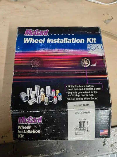 Ensemble neuf de noix de roues anti-vol McGuard 65554. M12 x 1.25 Comprend: 16 "tuner nuts" minces +...