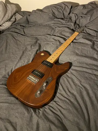 Bought this at a pawn shop years ago for $650. Has been kept in good condition. Body and neck built...
