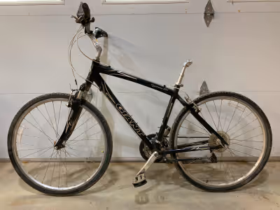 Giant 18-speed - good condition. 26 inch rim. When stored in shed, a squirrel ate some of the seat -...