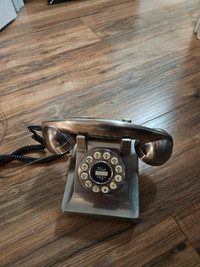 Crosley vintage style home phone. Brushed nickel in color.