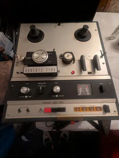 A Smith Corona Typewriter and pre-owned Vintage Roberts 778X Reel-to-Reel