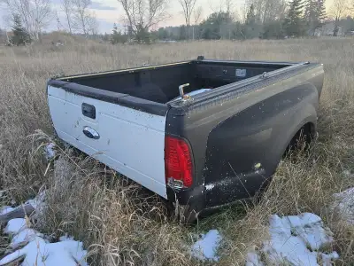 Fits 1999 - 2014 Box in good shape, minor scuffs and scratches. Sprayed in Liner. 6'9" Box with Roll...