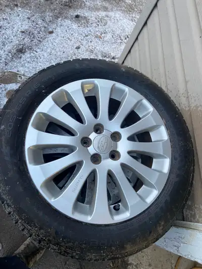 Four Subaru Impreza rims like new with 4 205-55r16 Nokian entyre 2.0 summer tires that are like new...