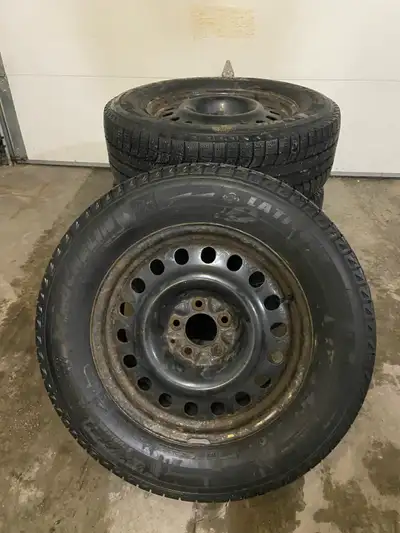 Used Michelin Latitude X-ice 235/65 R17 Winter SUV snow tires and steel rims. 5/32" tread depth rema...