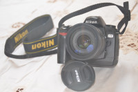Nikon D70 + 18 - 70mm lens plus