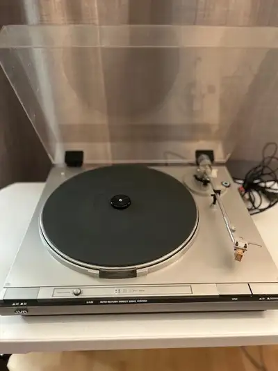 JVC L-A31 Auto Direct-Drive Turntable. Mid-90s. Silver. Used; in good condition. Cover has minor scu...