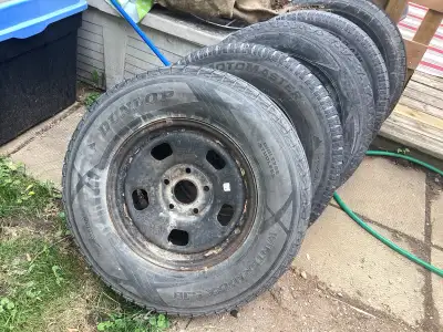 5 17 inch Ram truck wheel with Tpms 5 bolt with 2 fair tires good for spares. $100 total for all 5....