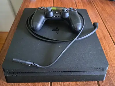 PS4 Slim 1TB + Original Controller, View more