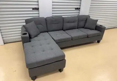 This stylish grey sectional sofa is perfect for any living space, offering both comfort and a modern...