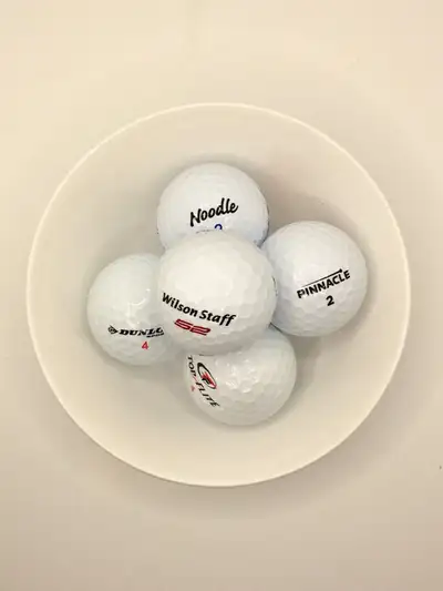 Golf balls in mint condition $10/dozen, View more